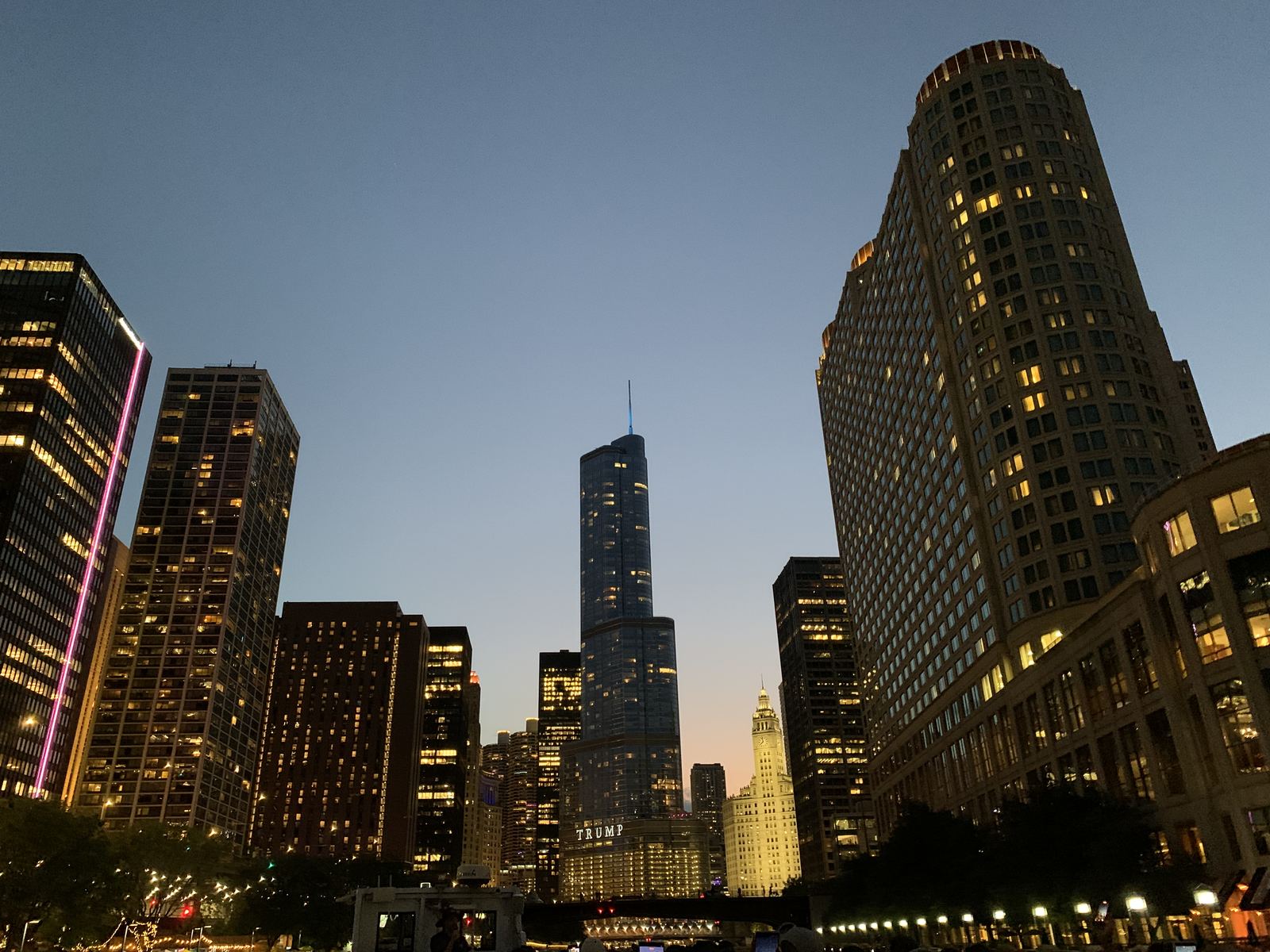 Trump International Hotel and Tower and the Wrigley Building lit up in the evening