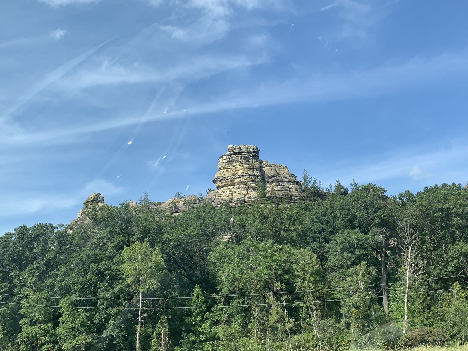 Sandstone "dells" cliffs above the forest by the Wisconsin River
